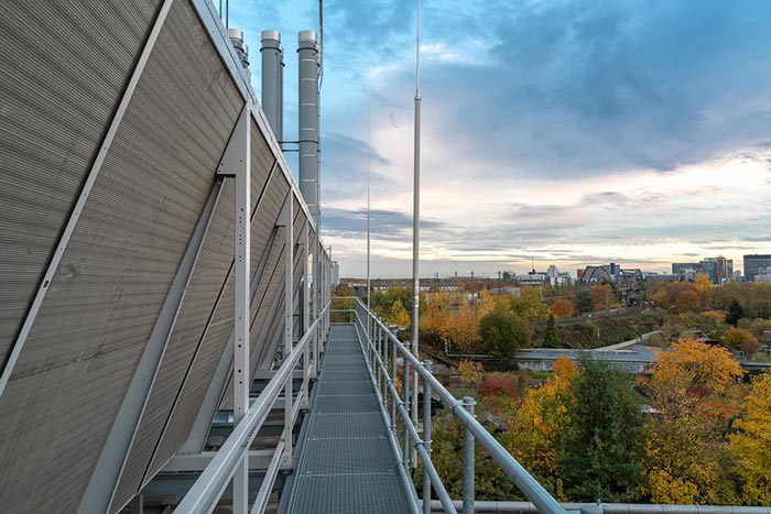 Image of the air conditioning system on the roof of our data center with parks in the background.